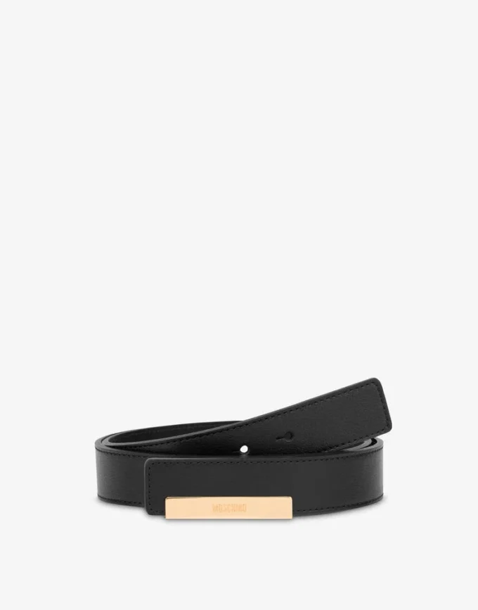 Kalvskinnsbälte med metallplatta
