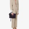 Moschino Tie Me Clutch: Exklusivt online Moschino Tie Me Clutch: Exklusivt online
