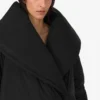 Oversized dunjacka i tekniskt tyg