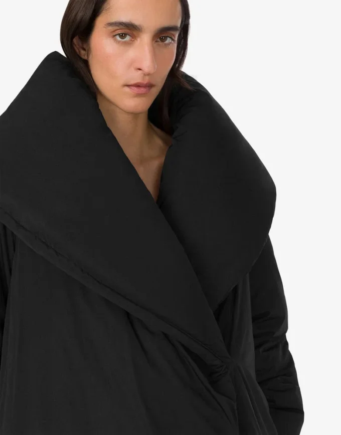 Oversized dunjacka i tekniskt tyg